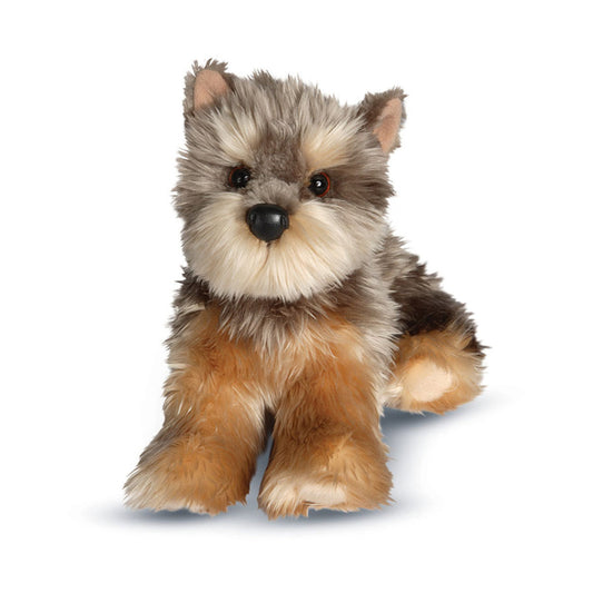 Det här är Yorkshireterriern Yettie, ett gosedjur från Douglas Cuddle Toys. Liten sittande hund med lång, raggig och lätt vågig päls med mjuk glans. Pälsen är grå på huvud och rygg, brun på kropp och ben, beige på nos, öronens insida, mage och tasstoppar, med vita inslag i ansiktet. Nosen är en rund beige fläck kring en svart, rundad nostipp, ögonen är mörkbruna. Mörkare grått runt ögonen och ljusa beige ögonbryn. Inga kläder eller accessoarer; vaken och vänlig uppsyn.