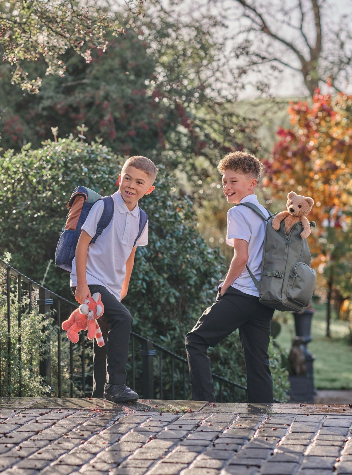 Boys on the way to school with Folly Fox and Charlie Bear