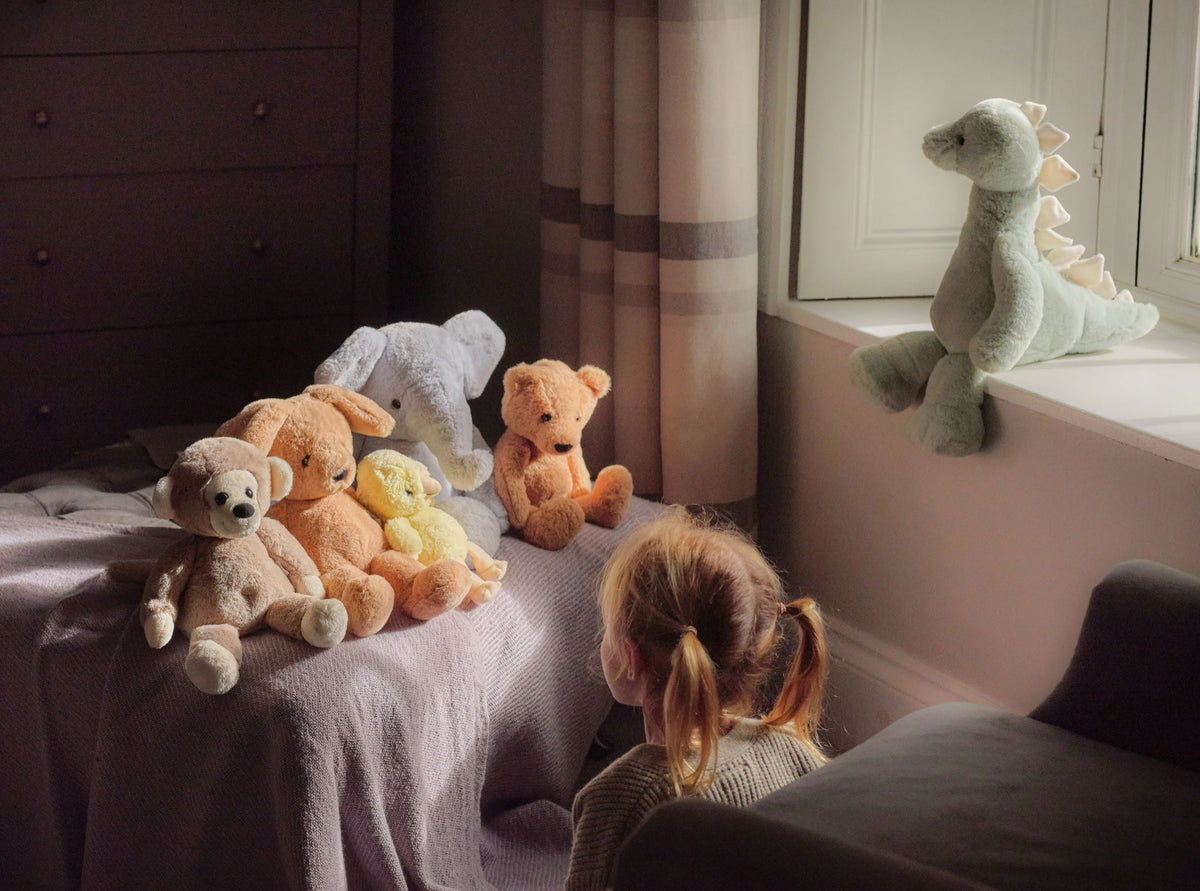 Child with a bedroom full of Bear & Me friends