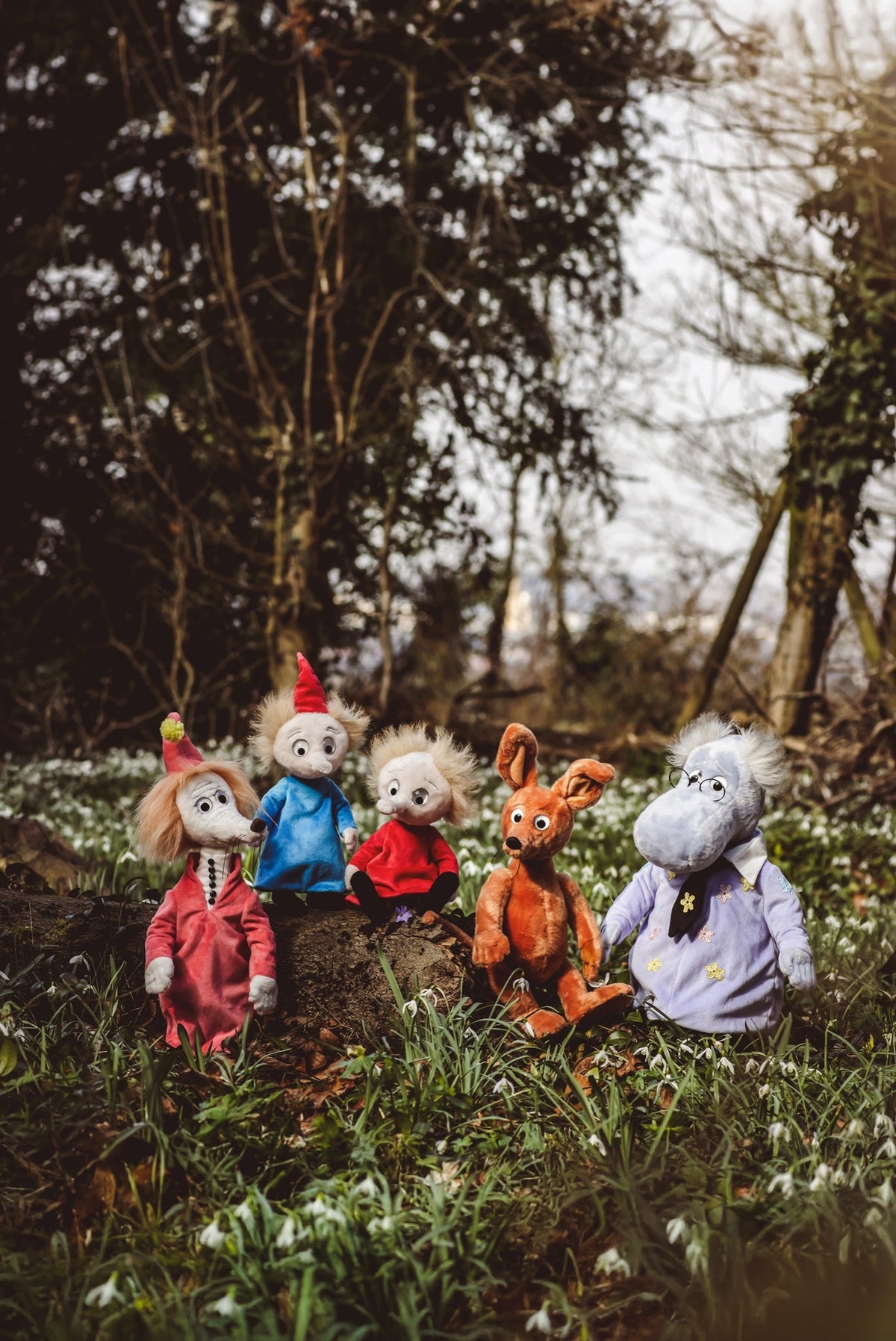 Thingumy, Bob, Sniff and the Hemulen among snowdrops