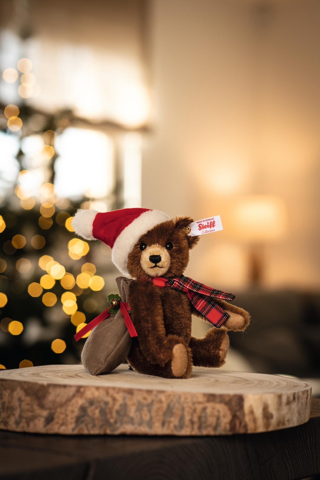 Santa Claus teddy on his log